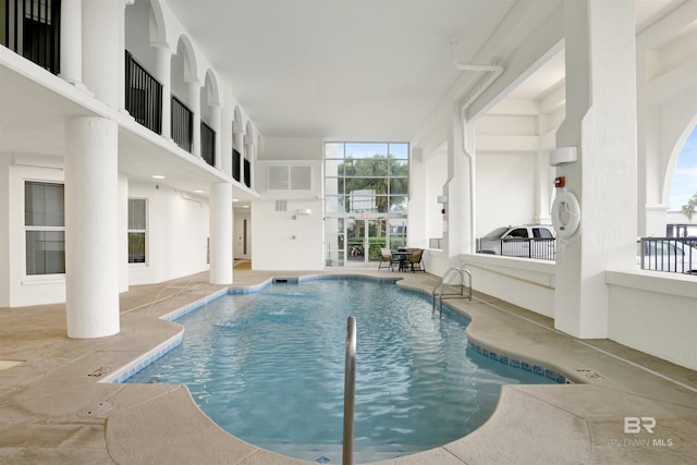 pool with a patio area