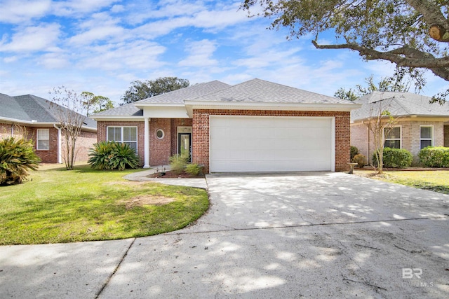 view of front of property featuring a front lawn, an attached garage, brick siding, and driveway