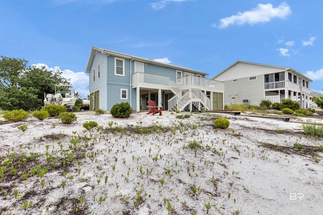 view of front property featuring a wooden deck