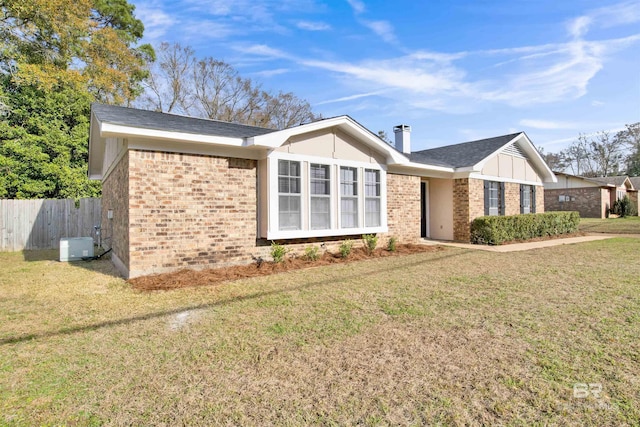 view of front of home with a front yard