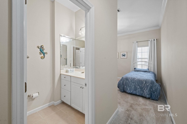 bathroom with vanity, tile patterned floors, and ornamental molding