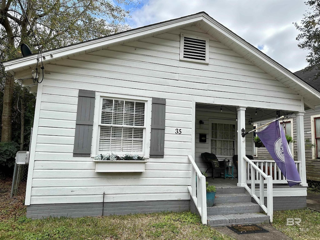 bungalow featuring a porch