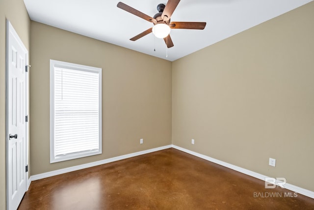 spare room with ceiling fan