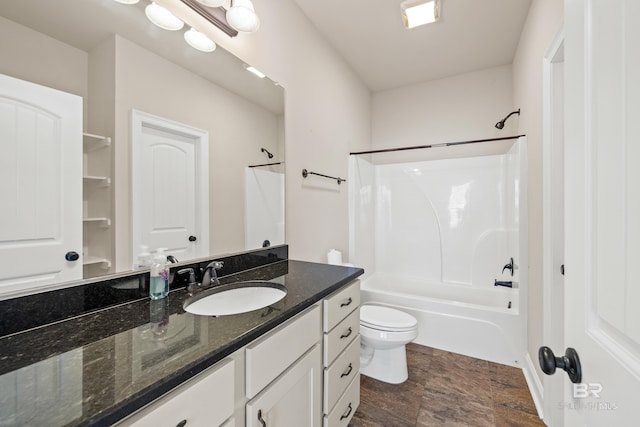 full bathroom with vanity, shower / bathtub combination, and toilet