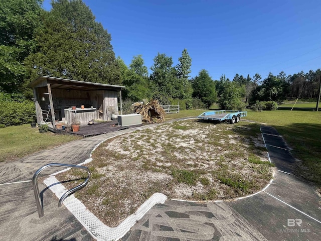 view of yard featuring a deck