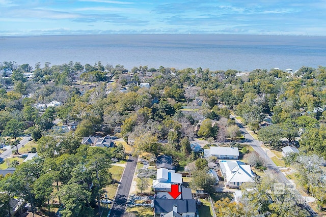 bird's eye view featuring a residential view and a water view