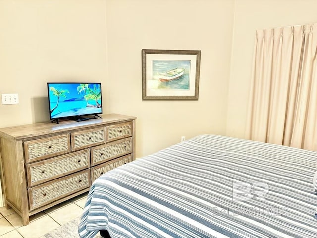 bedroom featuring light tile patterned floors