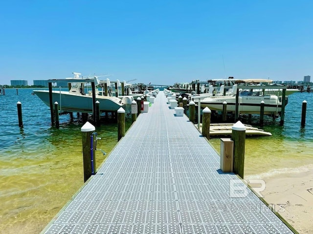 view of dock with a water view and boat lift