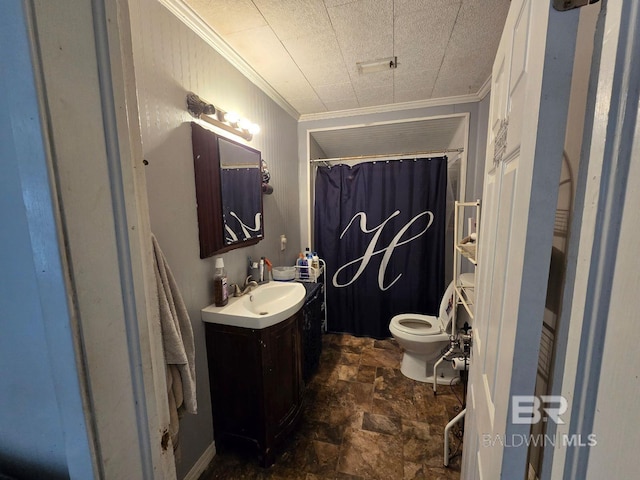 bathroom featuring vanity, toilet, curtained shower, and ornamental molding