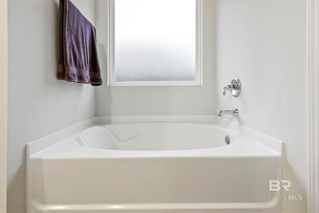 bathroom featuring a tub