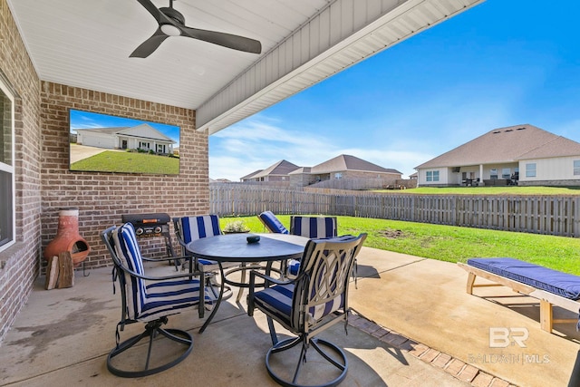 view of patio / terrace featuring ceiling fan