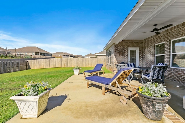 view of patio / terrace featuring ceiling fan