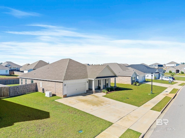 ranch-style house with a garage and a front lawn