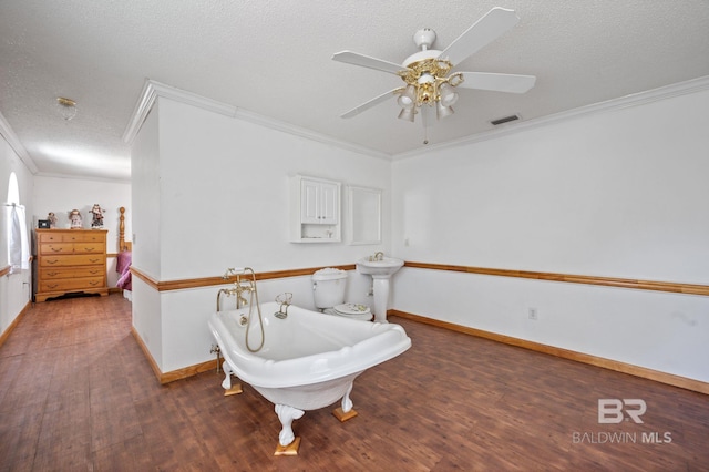 playroom with ceiling fan, wood-type flooring, crown molding, and a textured ceiling