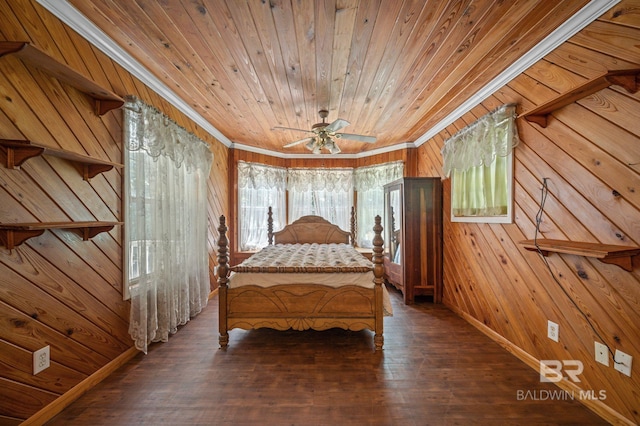 unfurnished bedroom featuring hardwood / wood-style flooring, wood walls, crown molding, and wooden ceiling