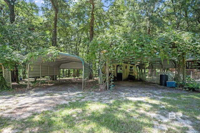 view of yard featuring a carport