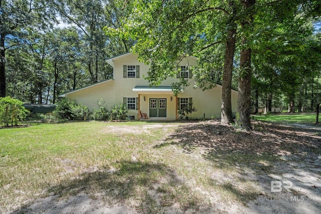 view of front of home with a front lawn