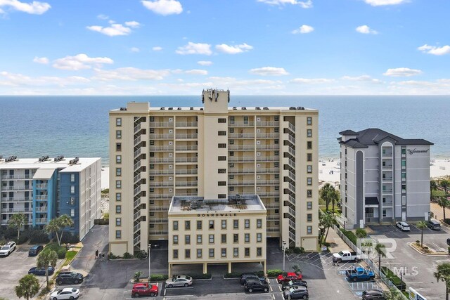 view of building exterior with a water view