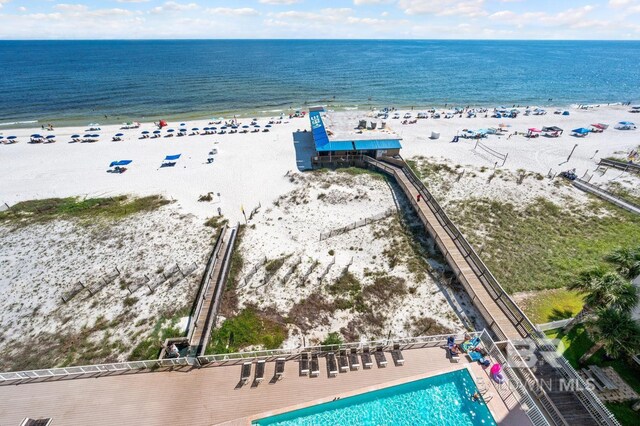 aerial view featuring a water view and a view of the beach