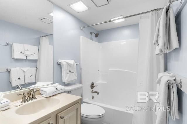 full bathroom with shower / bathtub combination with curtain, toilet, and vanity