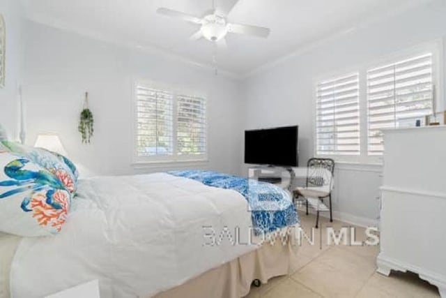 200 Peninsula Blvd Unit E101, Gulf Shores, AL 36542 - bedroom featuring tile patterned flooring, crown molding, ceiling fan, and baseboards