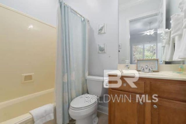 200 Peninsula Blvd Unit E101, Gulf Shores, AL 36542 - bathroom with vanity, toilet, and shower / bathtub combination with curtain