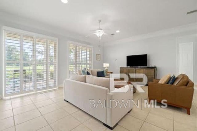 200 Peninsula Blvd Unit E101, Gulf Shores, AL 36542 - living room with a ceiling fan, recessed lighting, light tile patterned floors, and crown molding