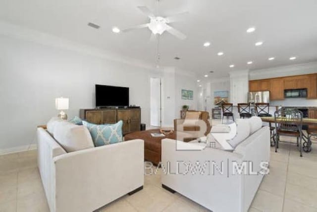 200 Peninsula Blvd Unit E101, Gulf Shores, AL 36542 - living area with light tile patterned flooring, a ceiling fan, recessed lighting, and baseboards