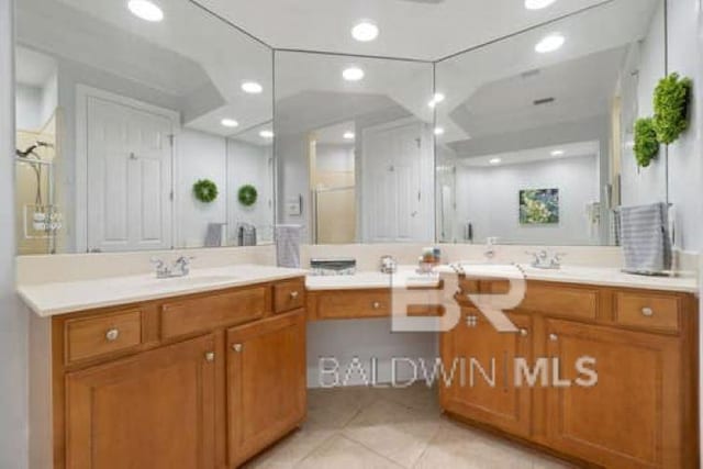 200 Peninsula Blvd Unit E101, Gulf Shores, AL 36542 - bathroom featuring vanity, recessed lighting, tile patterned flooring, and a shower