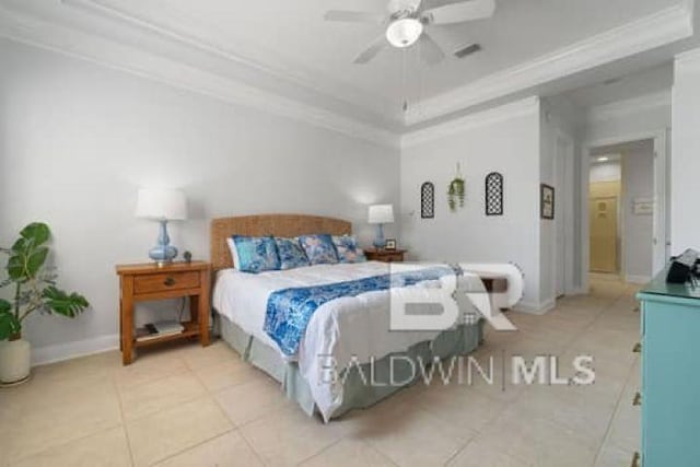 200 Peninsula Blvd Unit E101, Gulf Shores, AL 36542 - bedroom featuring crown molding, light tile patterned floors, a raised ceiling, a ceiling fan, and baseboards