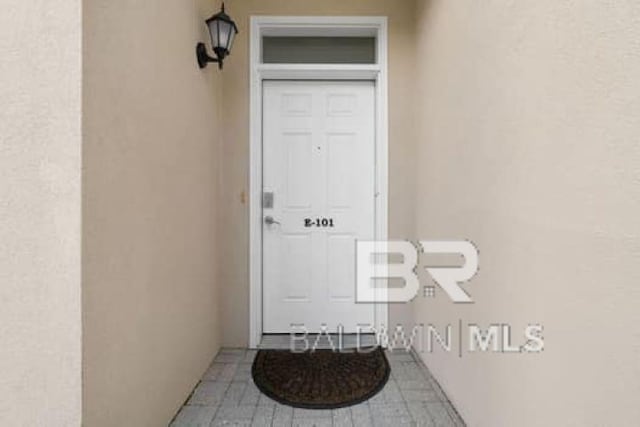 200 Peninsula Blvd Unit E101, Gulf Shores, AL 36542 - view of exterior entry with stucco siding