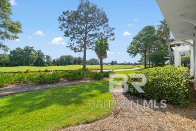 200 Peninsula Blvd Unit E101, Gulf Shores, AL 36542 - view of grassy yard