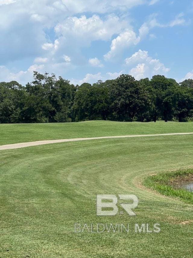 200 Peninsula Blvd Unit E101, Gulf Shores, AL 36542 - view of home's community featuring a lawn