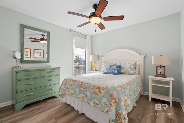 bedroom featuring wood-type flooring and ceiling fan