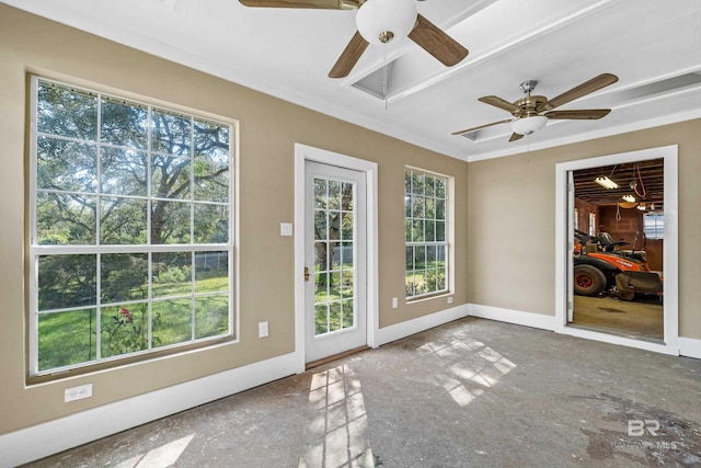 interior space with ceiling fan, a healthy amount of sunlight, and ornamental molding