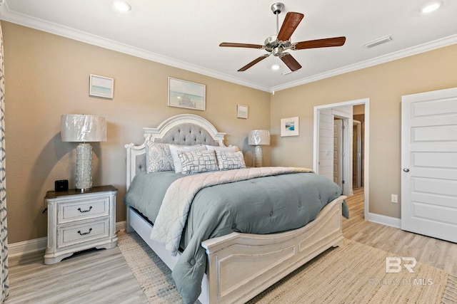 bedroom with ceiling fan, ornamental molding, and light hardwood / wood-style flooring