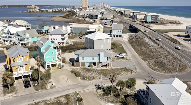 aerial view featuring a residential view and a water view