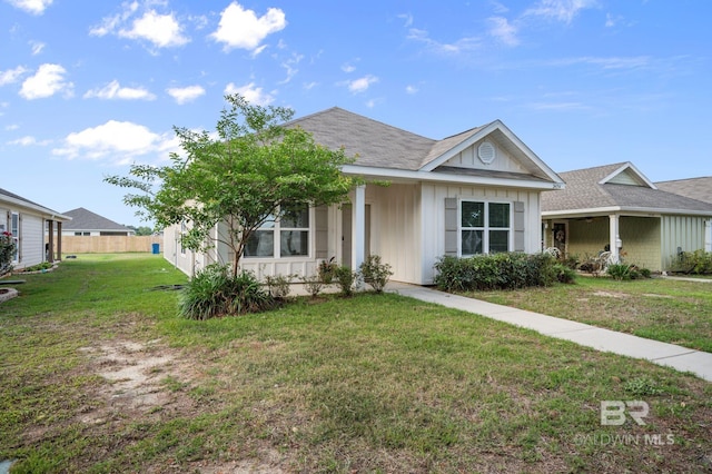 24154 Veranda Cir, Elberta, AL 36530 - single story home with board and batten siding and a shingled roof