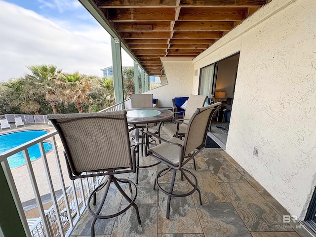 balcony with outdoor dining area