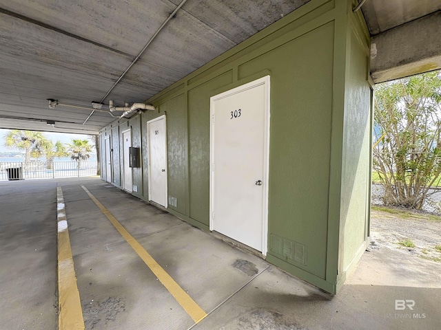 garage with fence