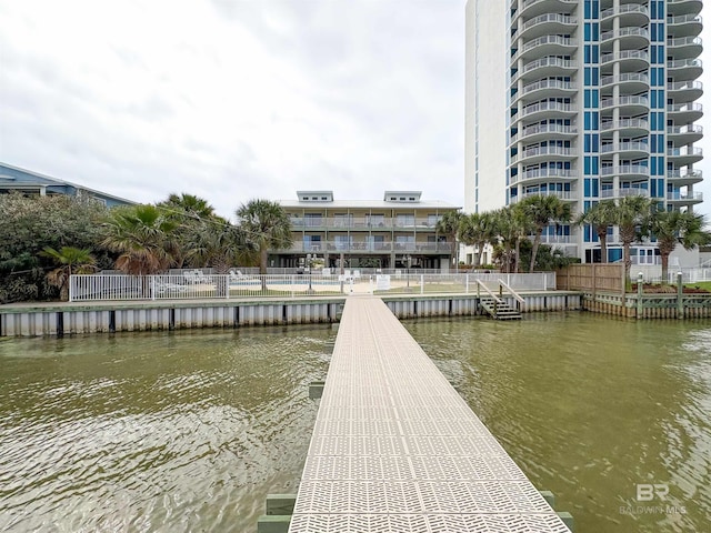 dock area with a water view