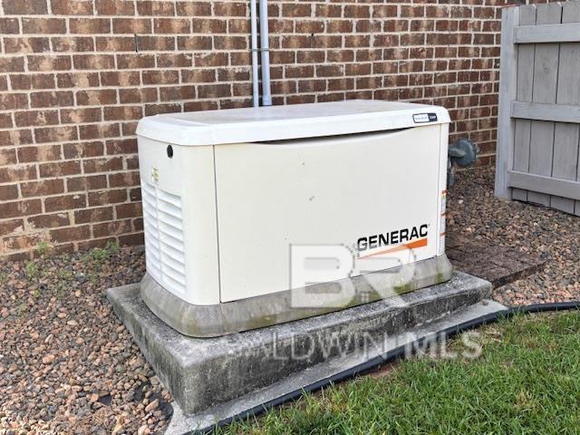 26716 Montelucia Way, Daphne, AL 36526 - exterior view of a power unit and brick siding