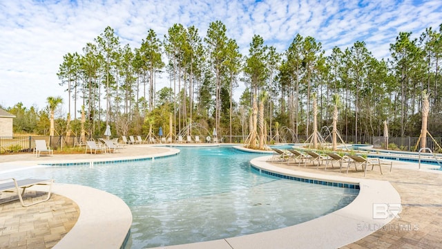 26716 Montelucia Way, Daphne, AL 36526 - community pool featuring fence, a patio, and view of wooded area