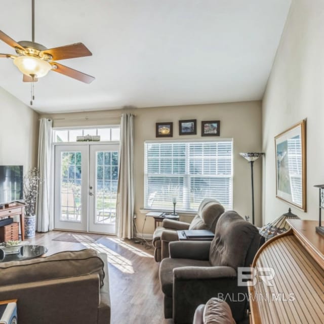 430 W Fort Morgan Rd Unit 1401, Gulf Shores, AL 36542 - living area featuring wood finished floors, french doors, and a ceiling fan