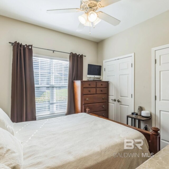 430 W Fort Morgan Rd Unit 1401, Gulf Shores, AL 36542 - bedroom featuring ceiling fan