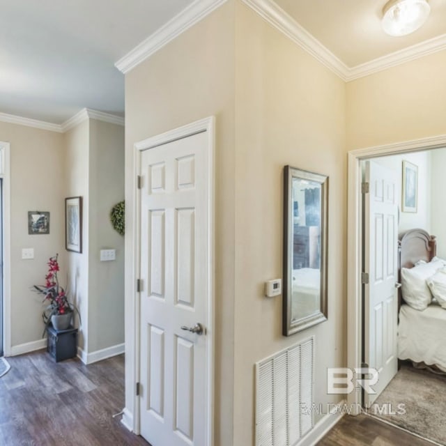 430 W Fort Morgan Rd Unit 1401, Gulf Shores, AL 36542 - entrance foyer with wood finished floors, crown molding, and baseboards