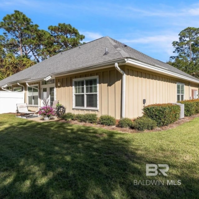 430 W Fort Morgan Rd Unit 1401, Gulf Shores, AL 36542 - rear view of house with board and batten siding and roof with shingles