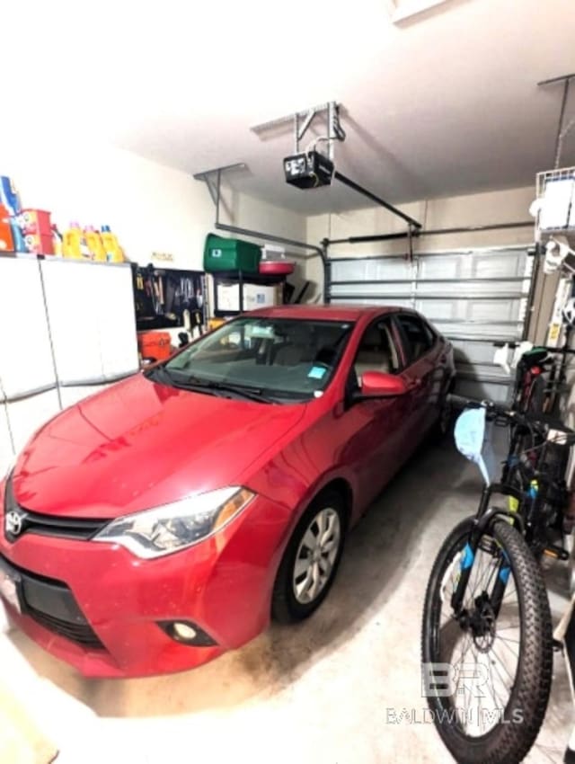 430 W Fort Morgan Rd Unit 1401, Gulf Shores, AL 36542 - garage with a garage door opener