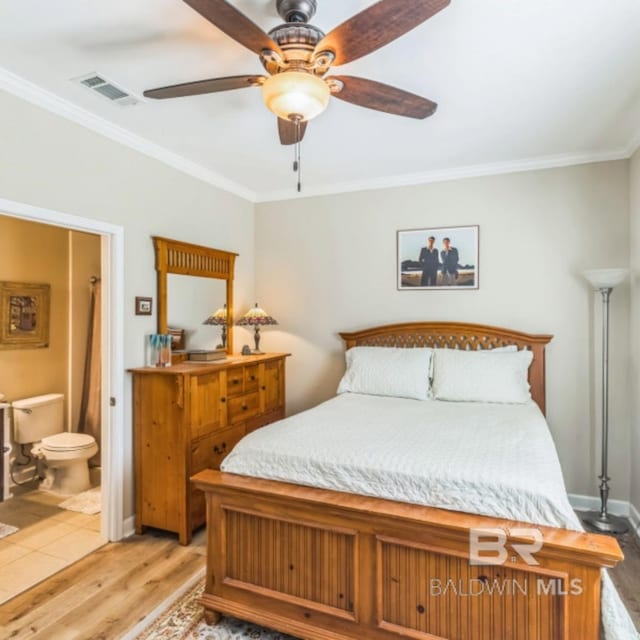 430 W Fort Morgan Rd Unit 1401, Gulf Shores, AL 36542 - bedroom with light wood-style floors, crown molding, connected bathroom, a ceiling fan, and baseboards