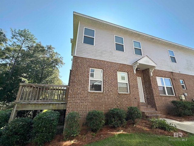 view of front of house with a deck